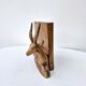 Old antelope bookend in hand carved wood