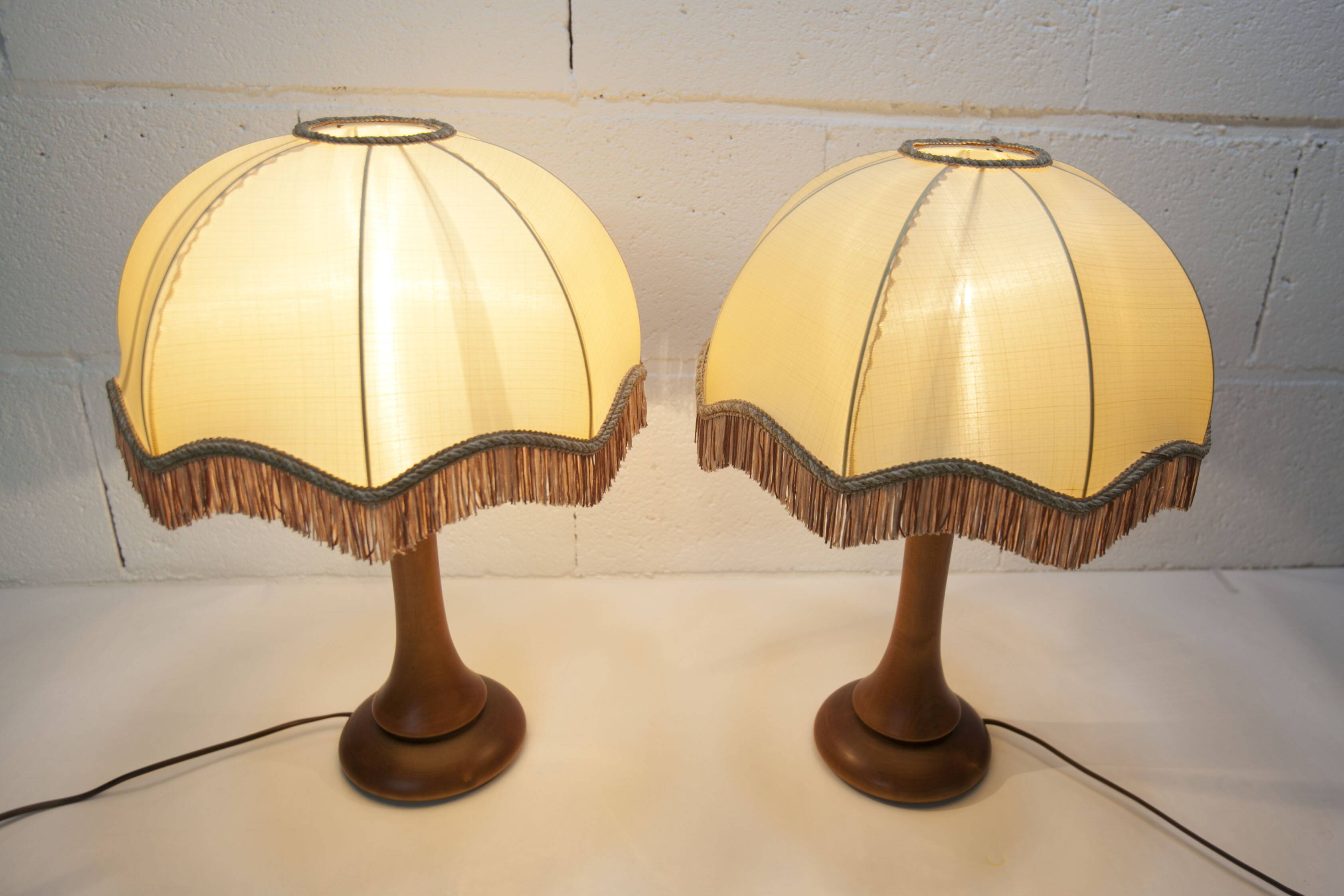 Pair of 1930s Art Deco bedside lamps with fringes, solid wood legs 52cm