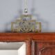 Antique mirror in exotic wood with chinoiserie carvings, 19th century.