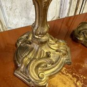Pair of bronze candlesticks from the early 20th century in Louis XV style.