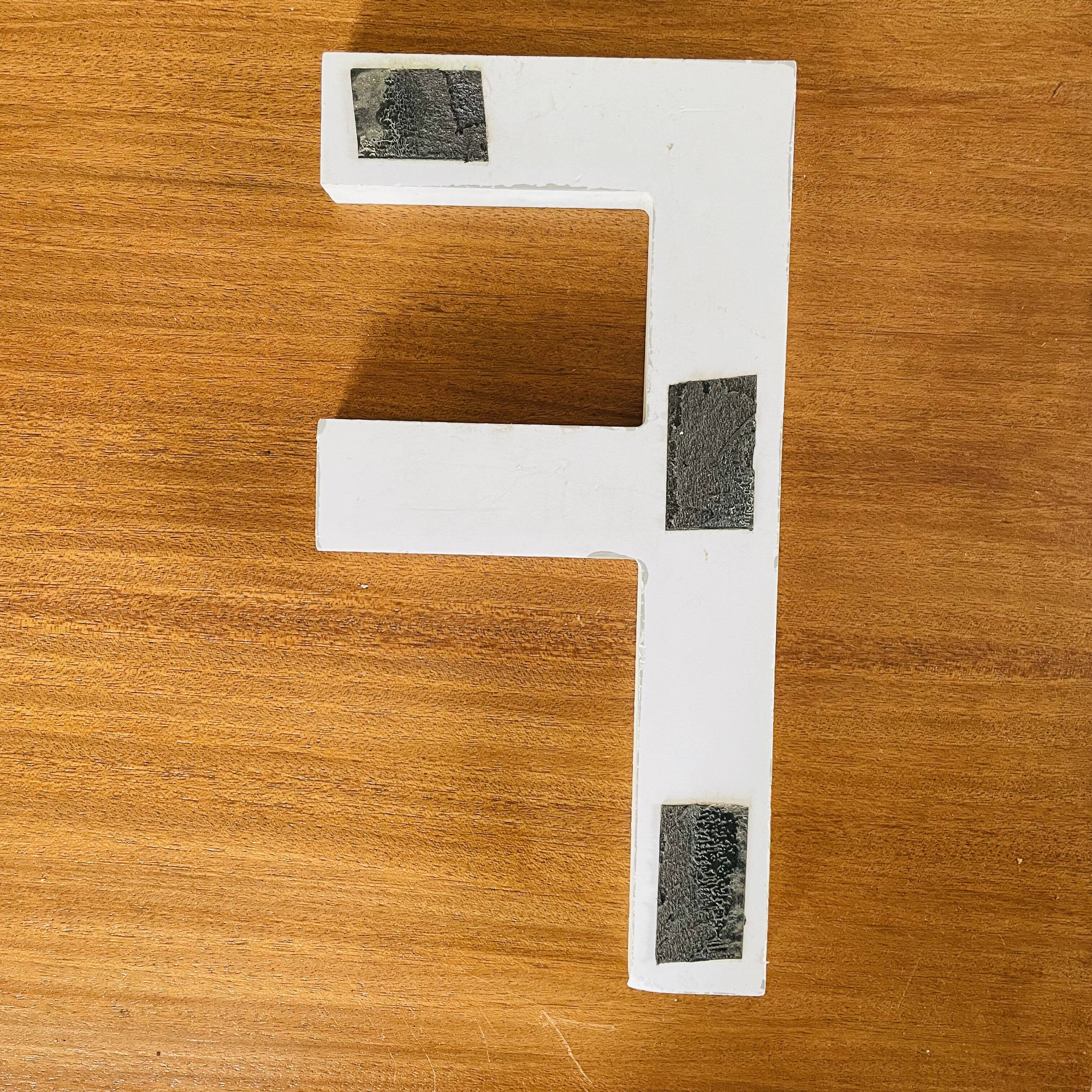 Wooden sign letter "F"