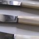 Set de 6 couteaux en inox et bakélite