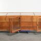 Large vintage wooden counter / display cabinet with 4 doors and glass
