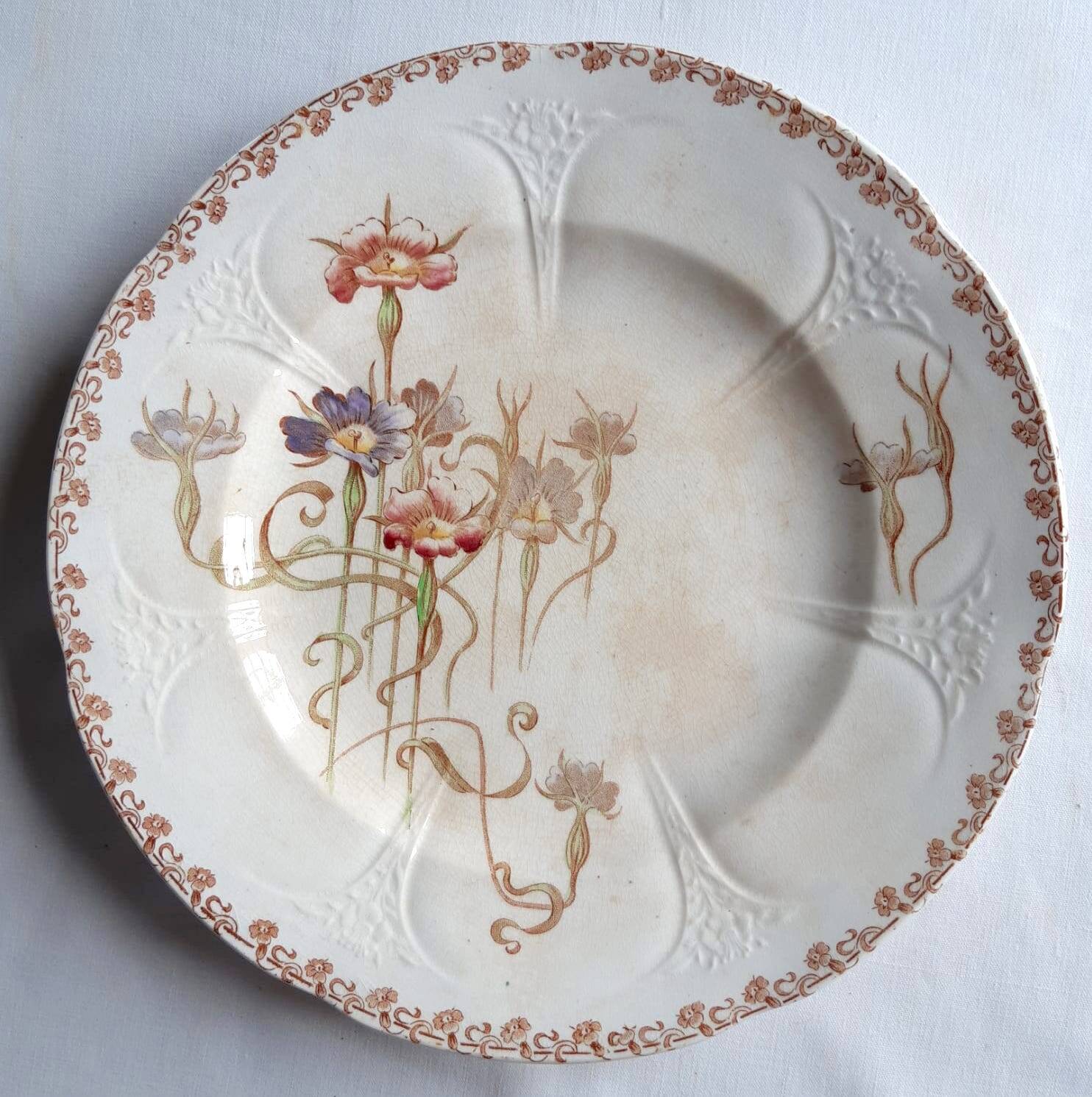 Set of 7 nielles model plates in longwy earthenware, art nouveau, circa 1900
