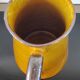 Vintage glazed terracotta pitcher