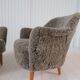 Samspel lounge chairs in sheepskin/mouton modernist mid-century by Carl Malmsten.