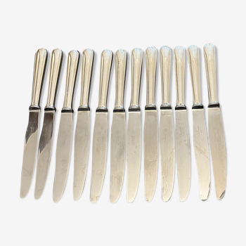 12 petits couteaux en métal argenté Christofle