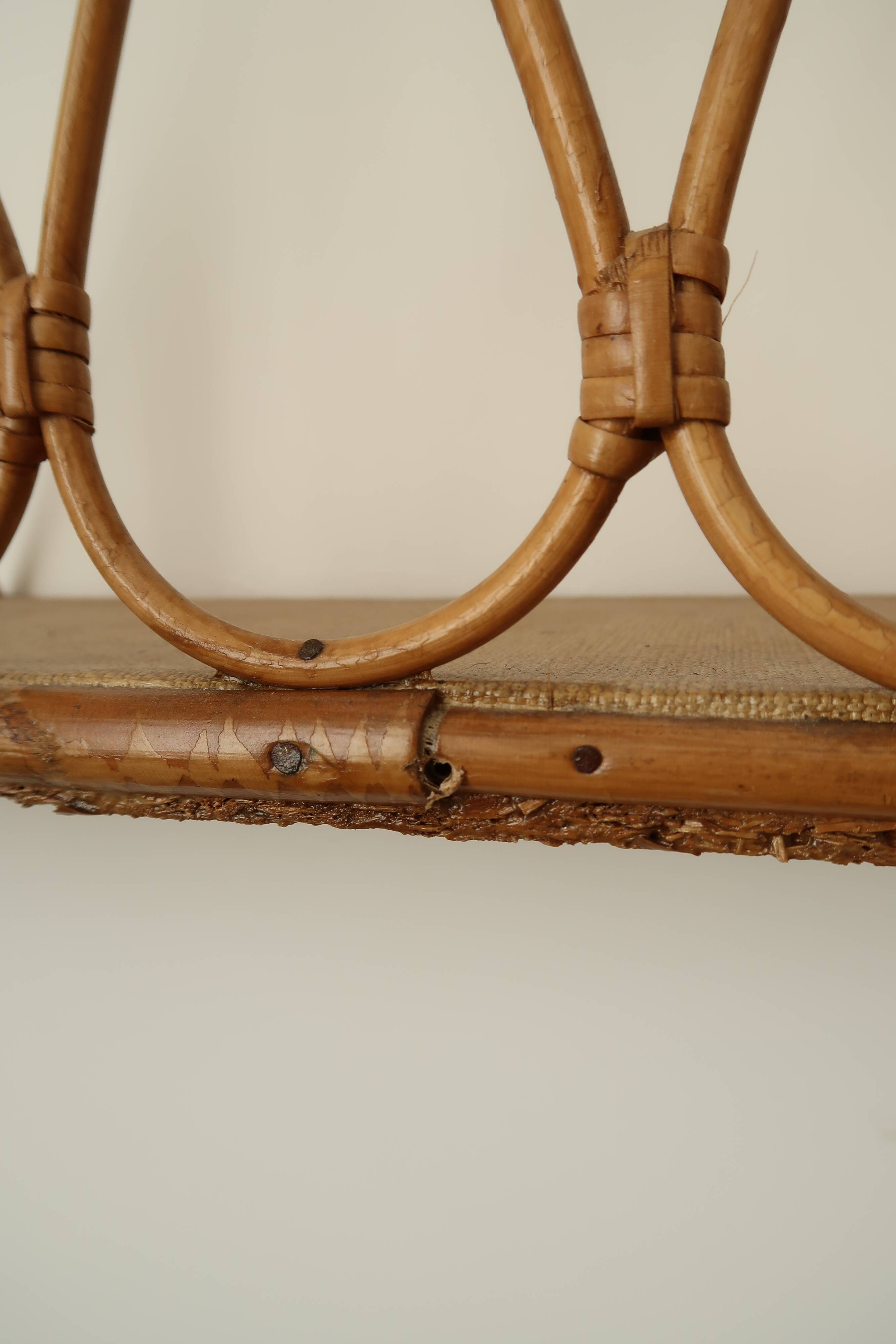 Pair of rattan wall shelves