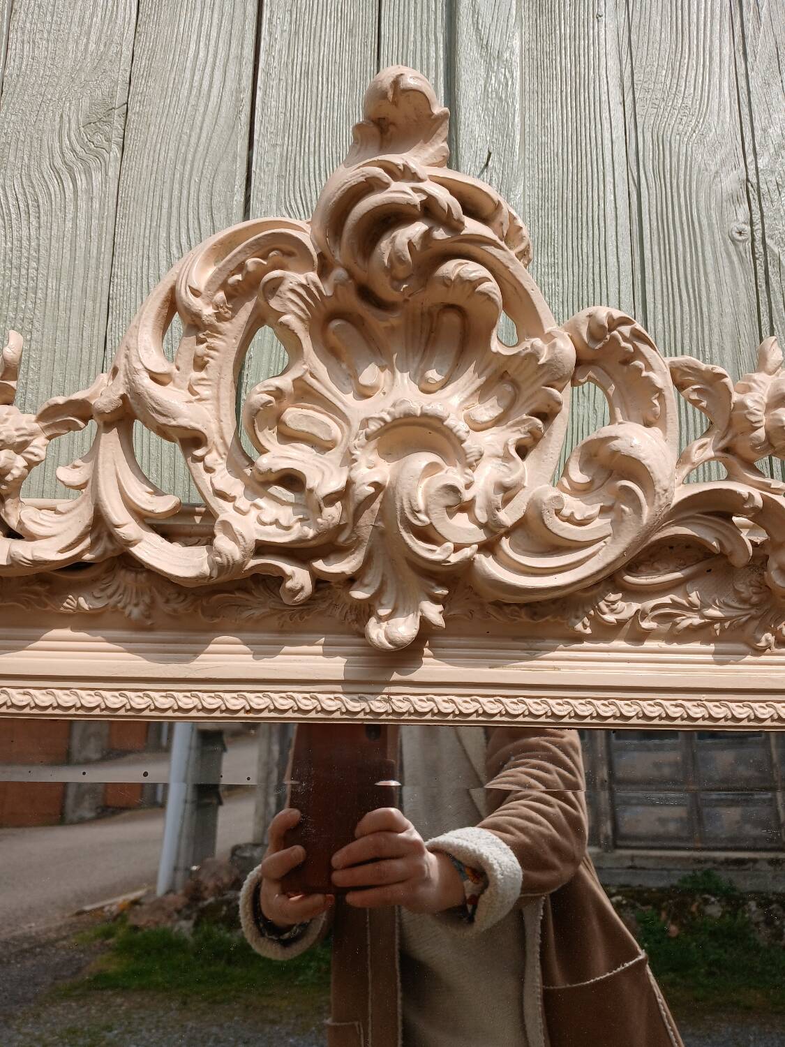 Antique carved wooden mirror