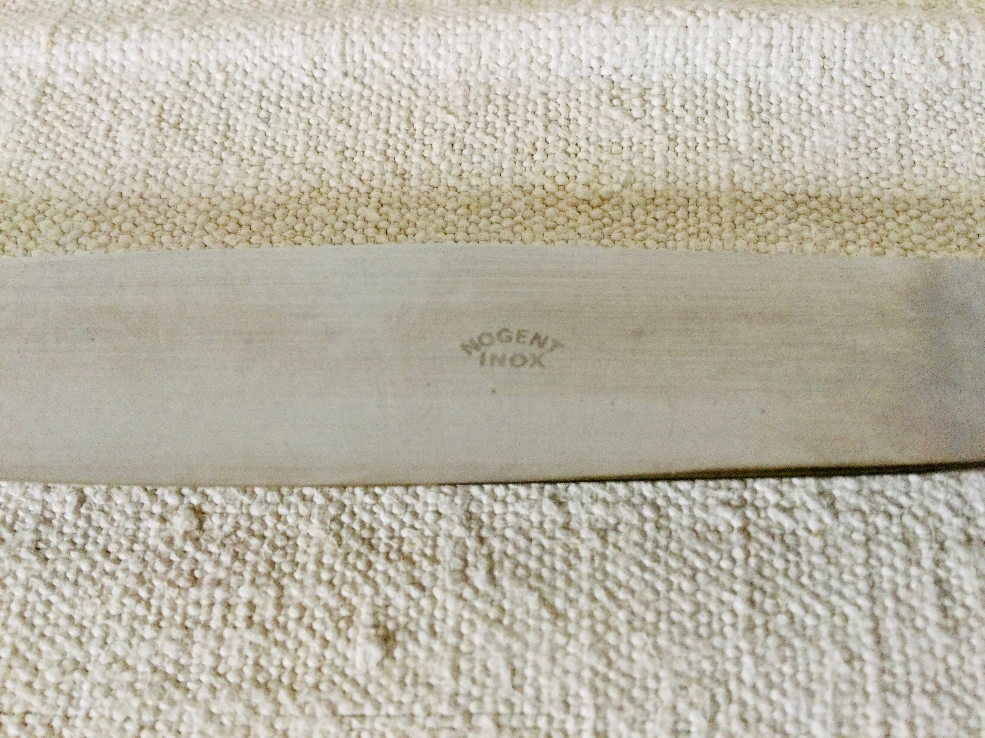 12 silver metal handle knives