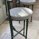 Set of 4 patinated bronze stools in the spirit of Giacometti.