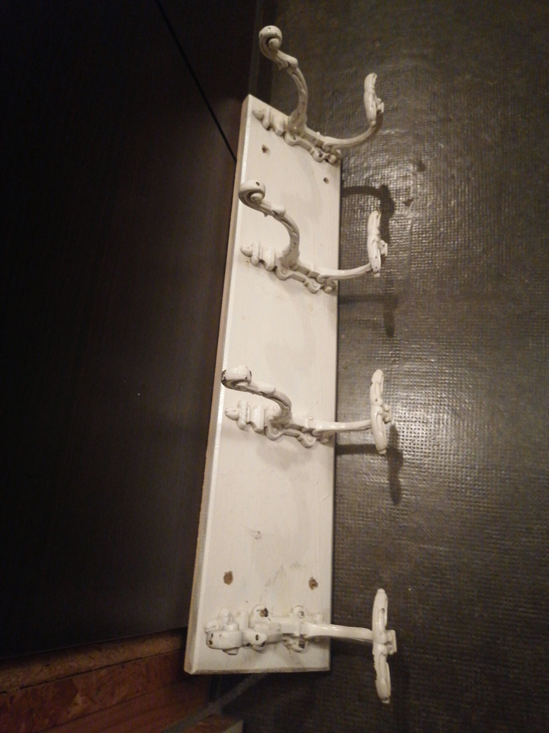 Coat rack with 4 old wrought iron and wooden hooks