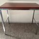 Trio of teak and chrome metal nesting tables from the 60s-70s