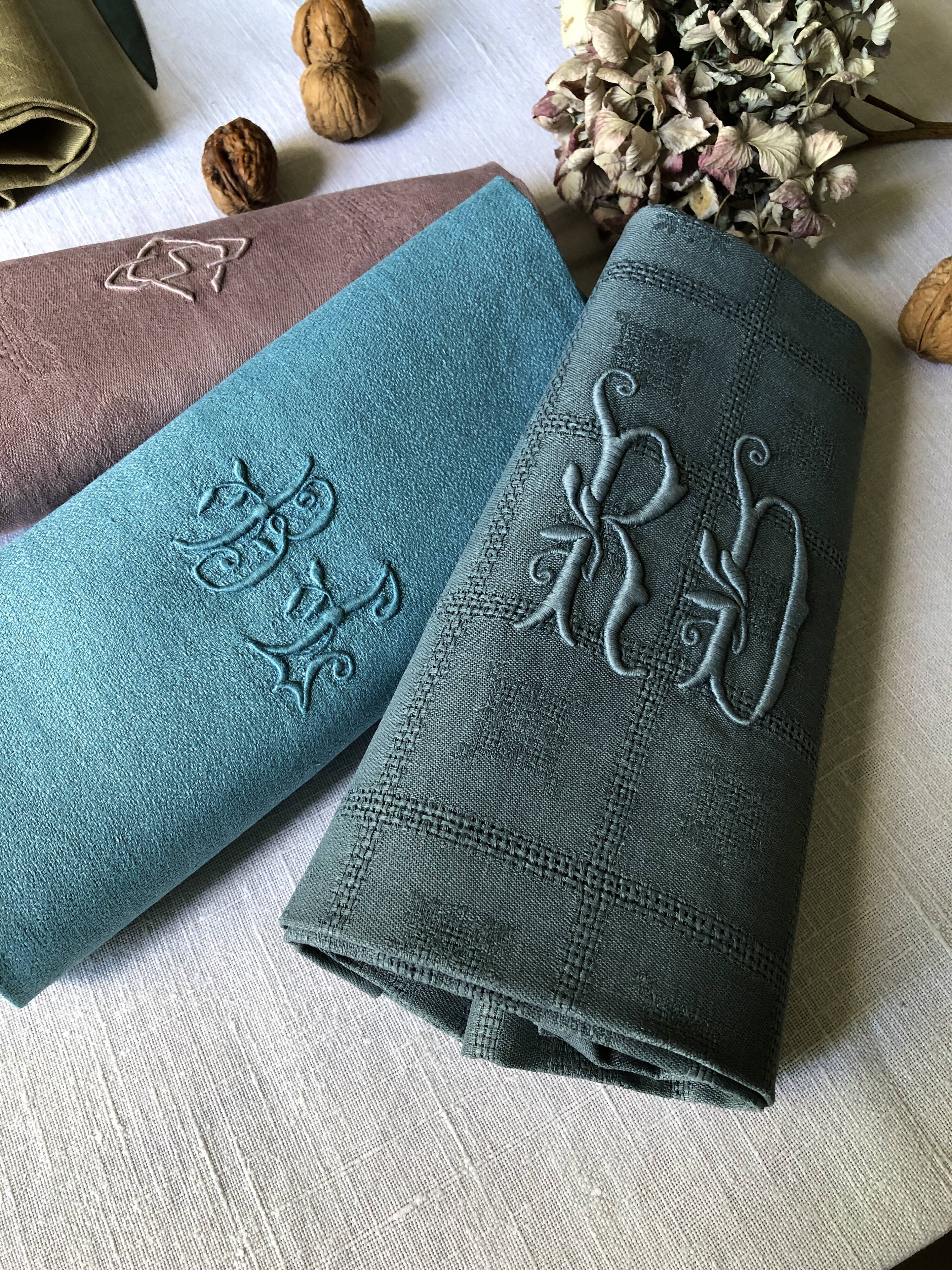 Suite of four tinted antique napkins