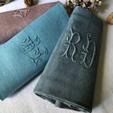 Suite of four tinted antique napkins