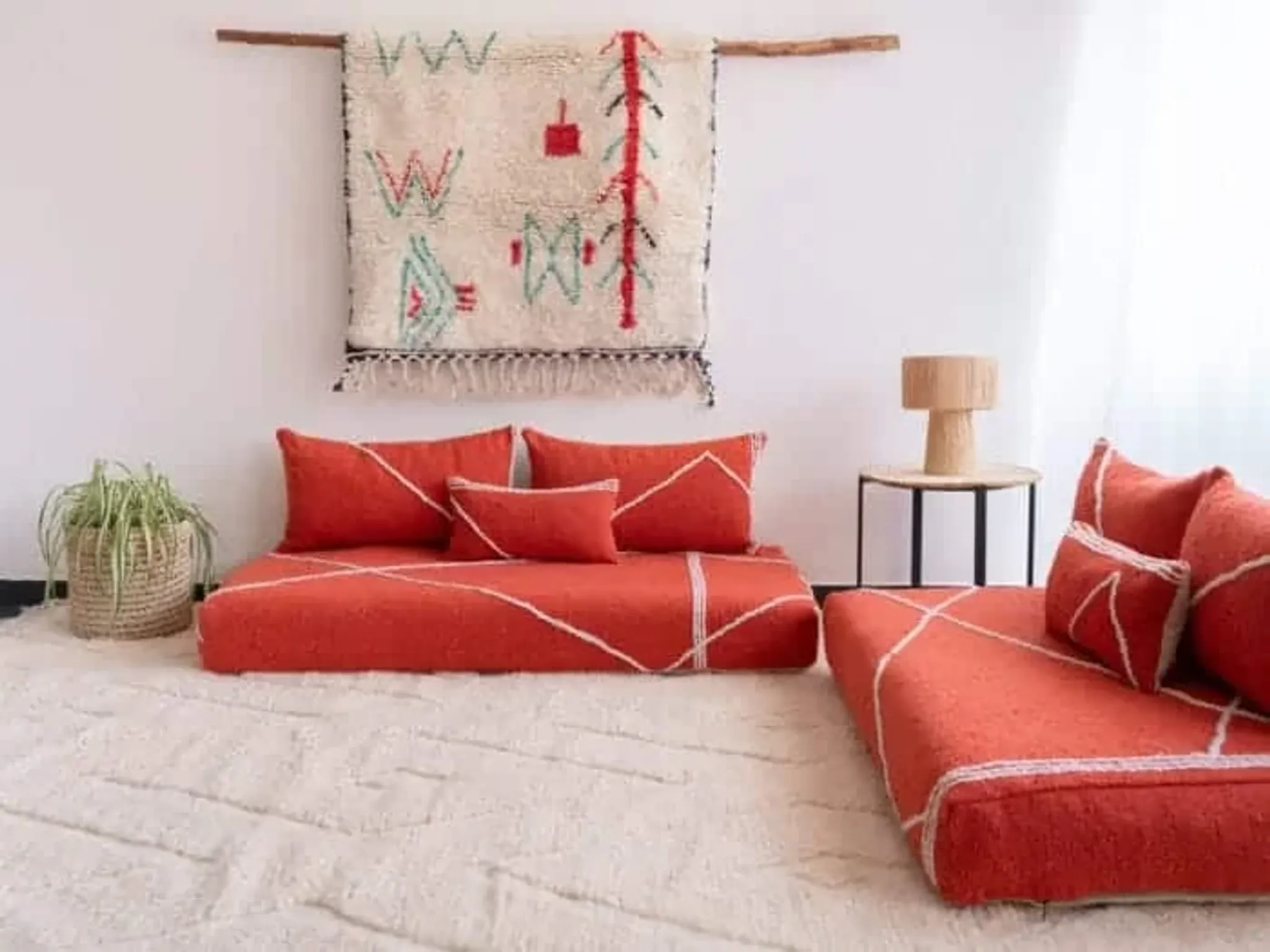 Handmade Moroccan floor cushion in orange cotton.