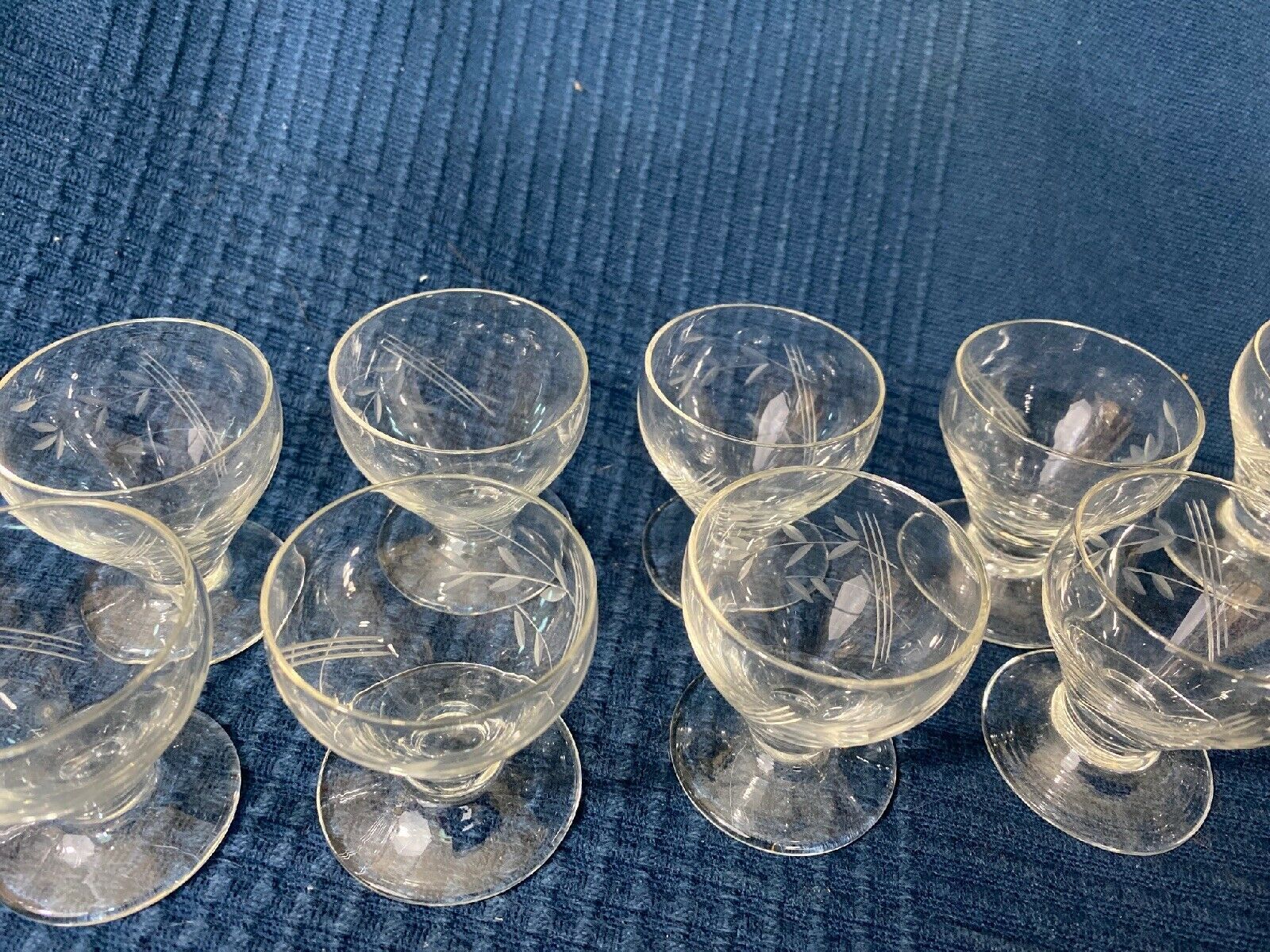 Set of 12 hand-sized crystal glasses with flower decoration
