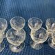 Set of 12 hand-sized crystal glasses with flower decoration