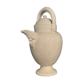 Large white faience jug with a satyr head spout, 19th century.