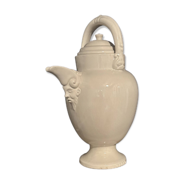 Large white faience jug with a satyr head spout, 19th century.