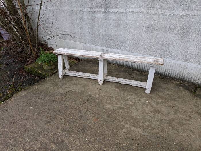 Old bench limed in white
