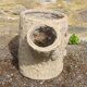 Tree trunk planter in concrete