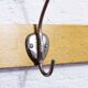 Peg wood and metal, wearing vintage coat