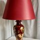 Vintage 1970 red and gold ceramic lamp with oriental decorations.