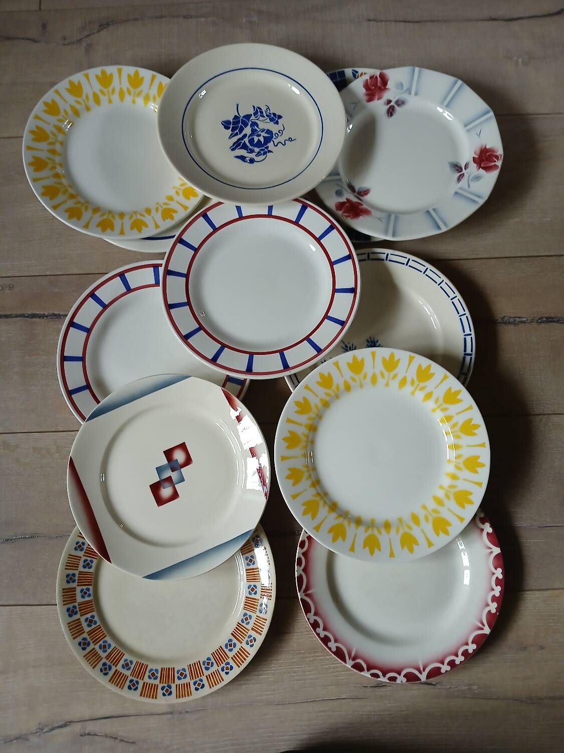 12 mismatched antique dinner plates