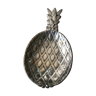 Empty silver metal pocket in pineapple shape