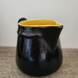 Old navy and yellow pitcher