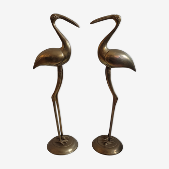 Duo brass herons