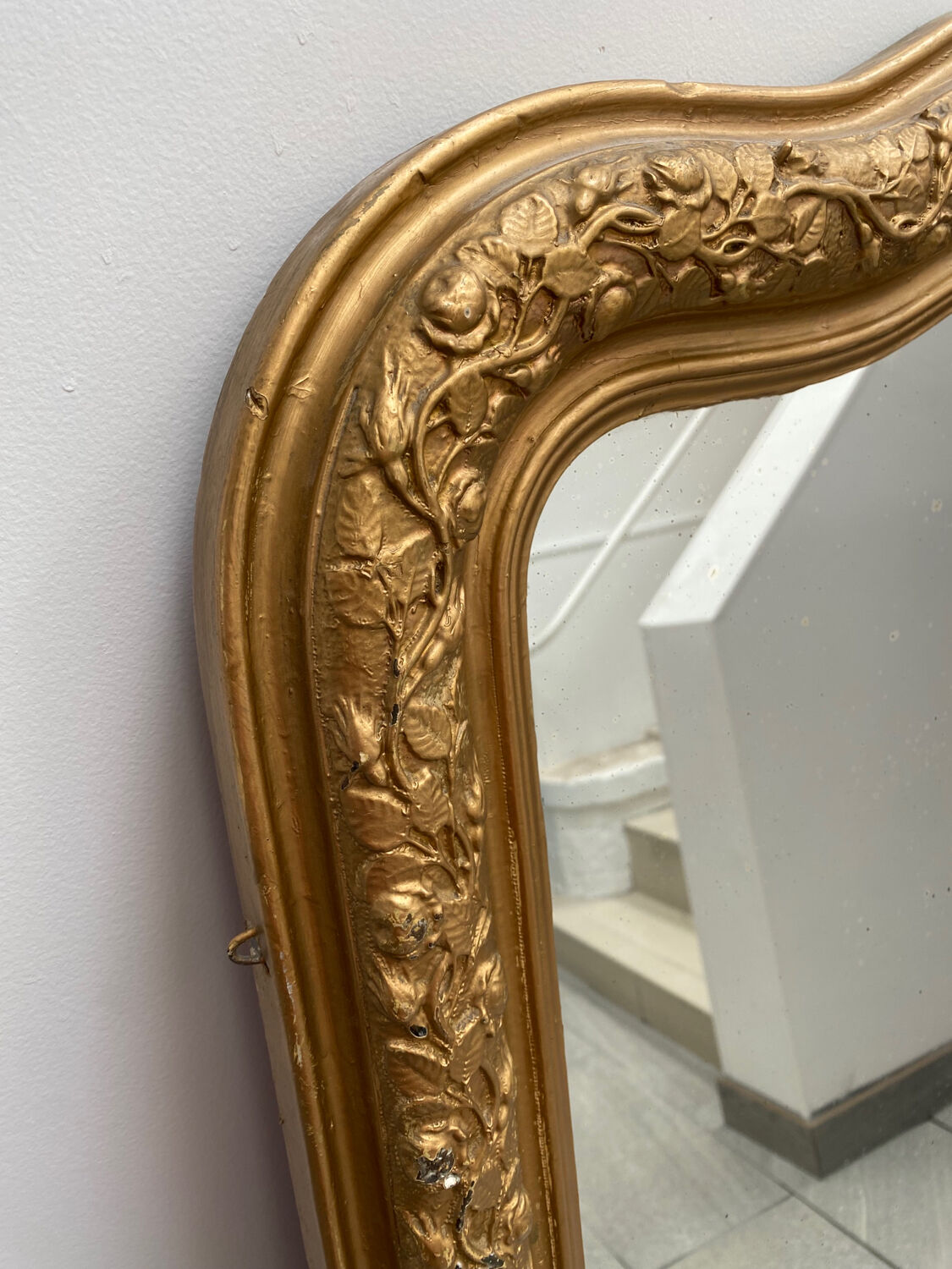 Large gilded patinated trumeau mirror