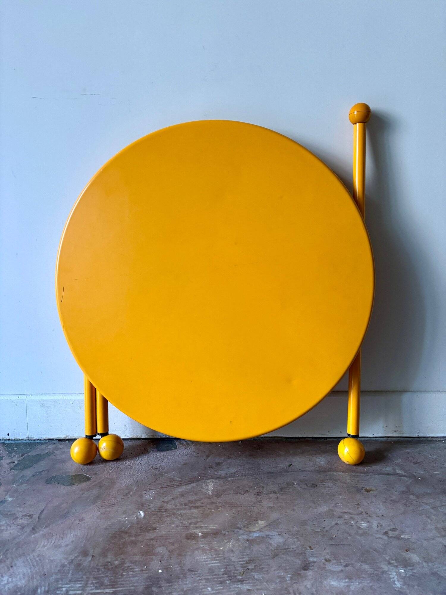 Yellow metal tripod coffee table by Tord Bjorklund for Ikea, circa 1980