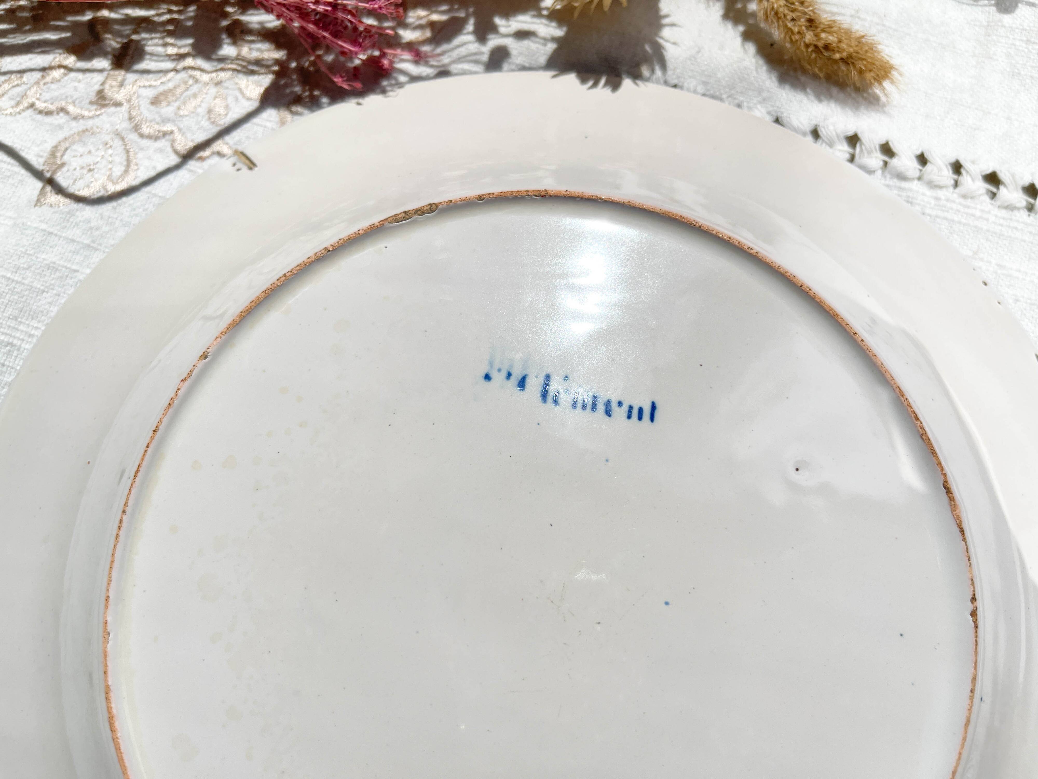2 St Clement Luneville plates, 19th century, floral pattern