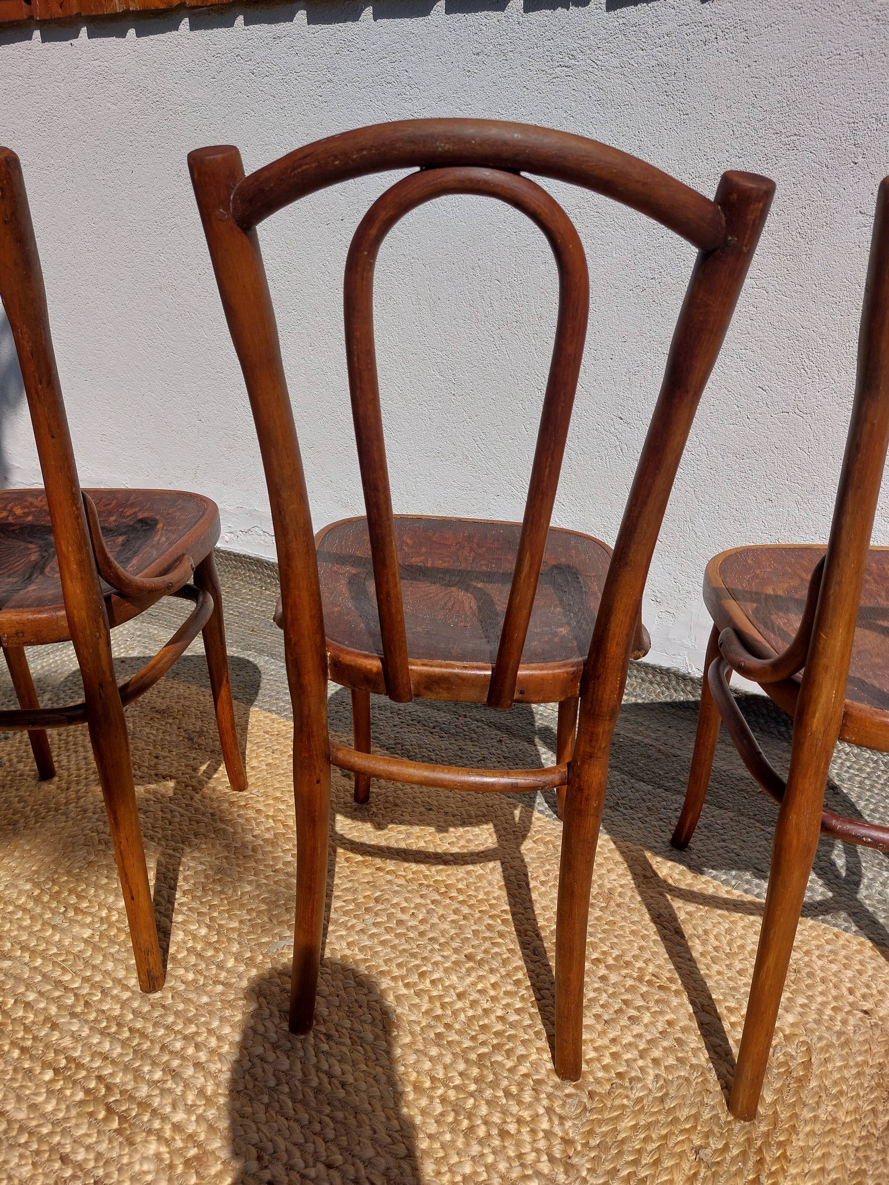 set of 3 curved wooden bistro chairs with patterns