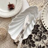 Ravier coquillage en porcelaine ancienne