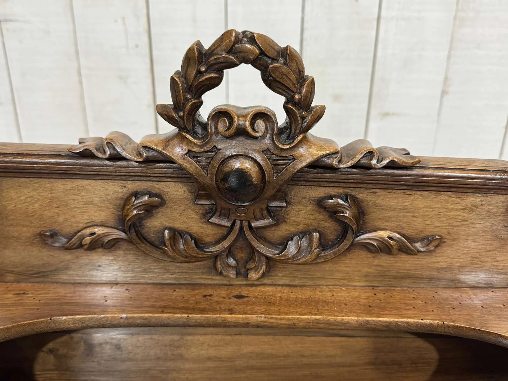 Louis XVI style desk from the late 19th century in walnut with a leather top.