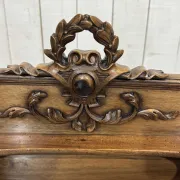 Louis XVI style desk from the late 19th century in walnut with a leather top.
