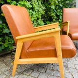 Pair of armchairs from the 50s in brown skaï