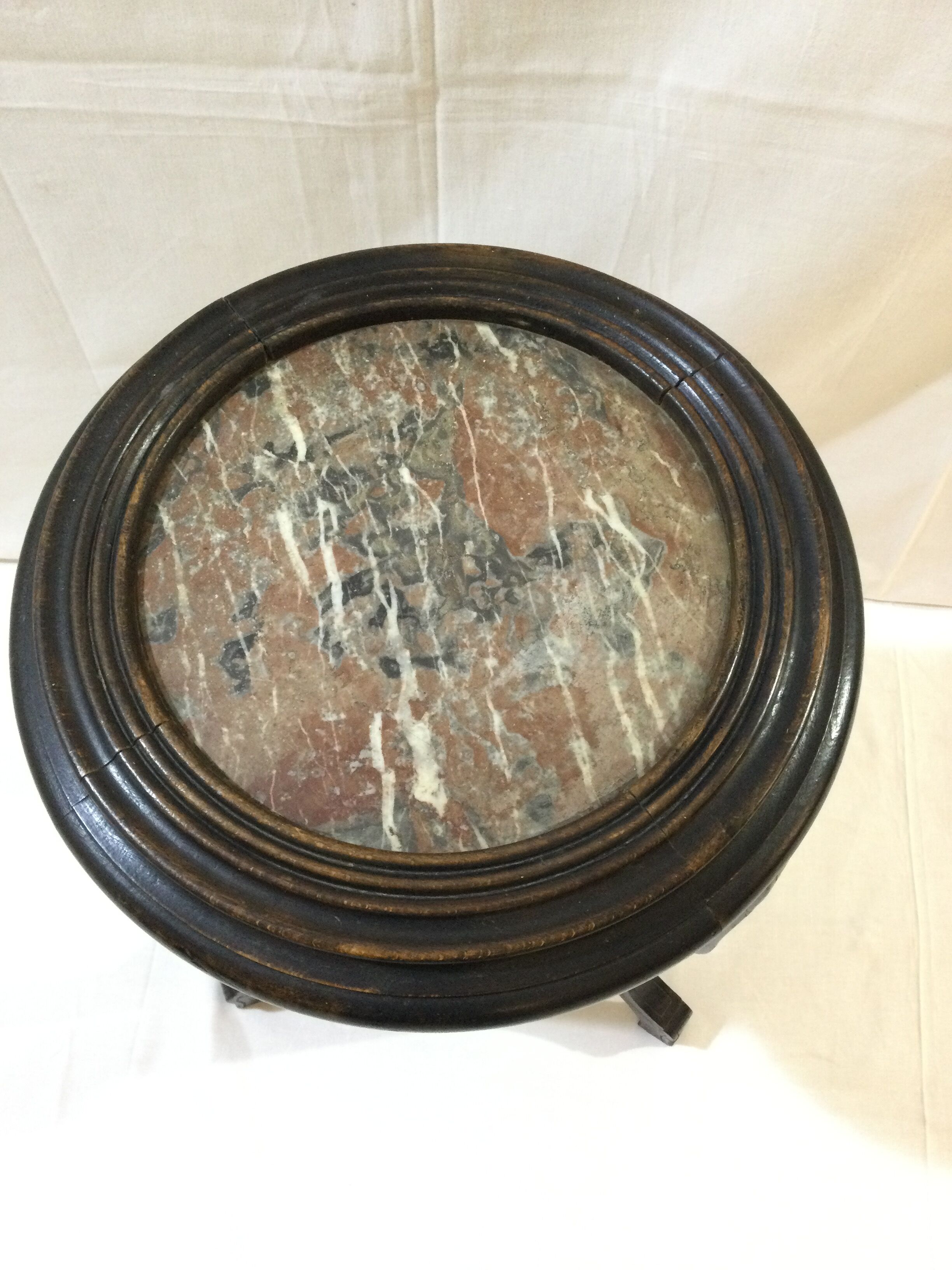 Blackened wooden and marble harness