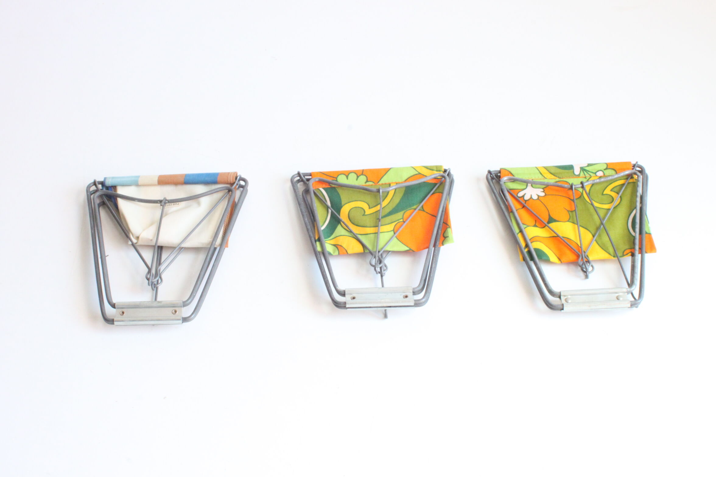 Nomad folding camping stools, France 1950s, set of three.