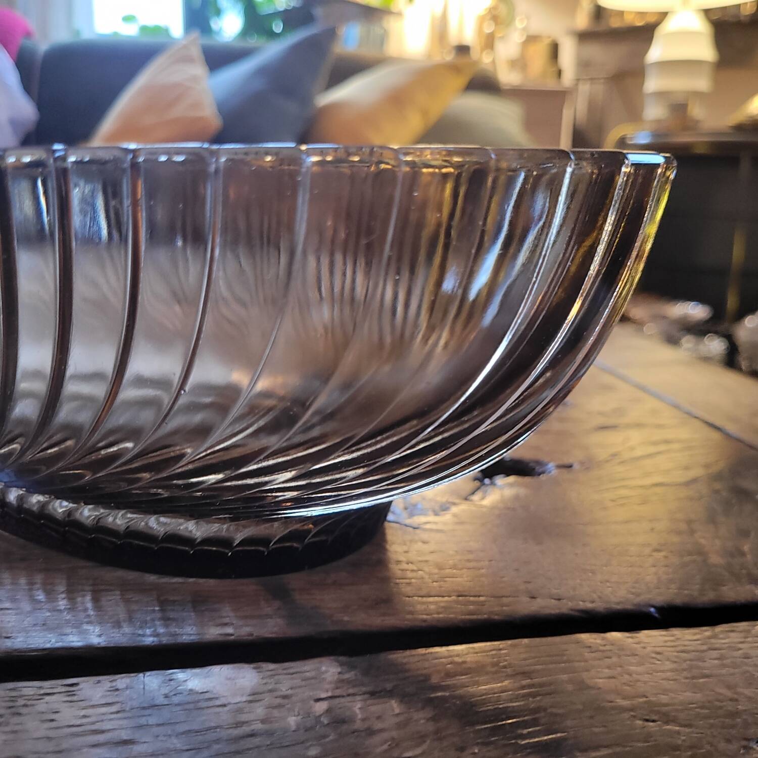Smoked glass bowl with a radiating embossed pattern — 1970s