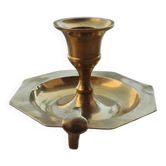 Octagonal brass candlestick.