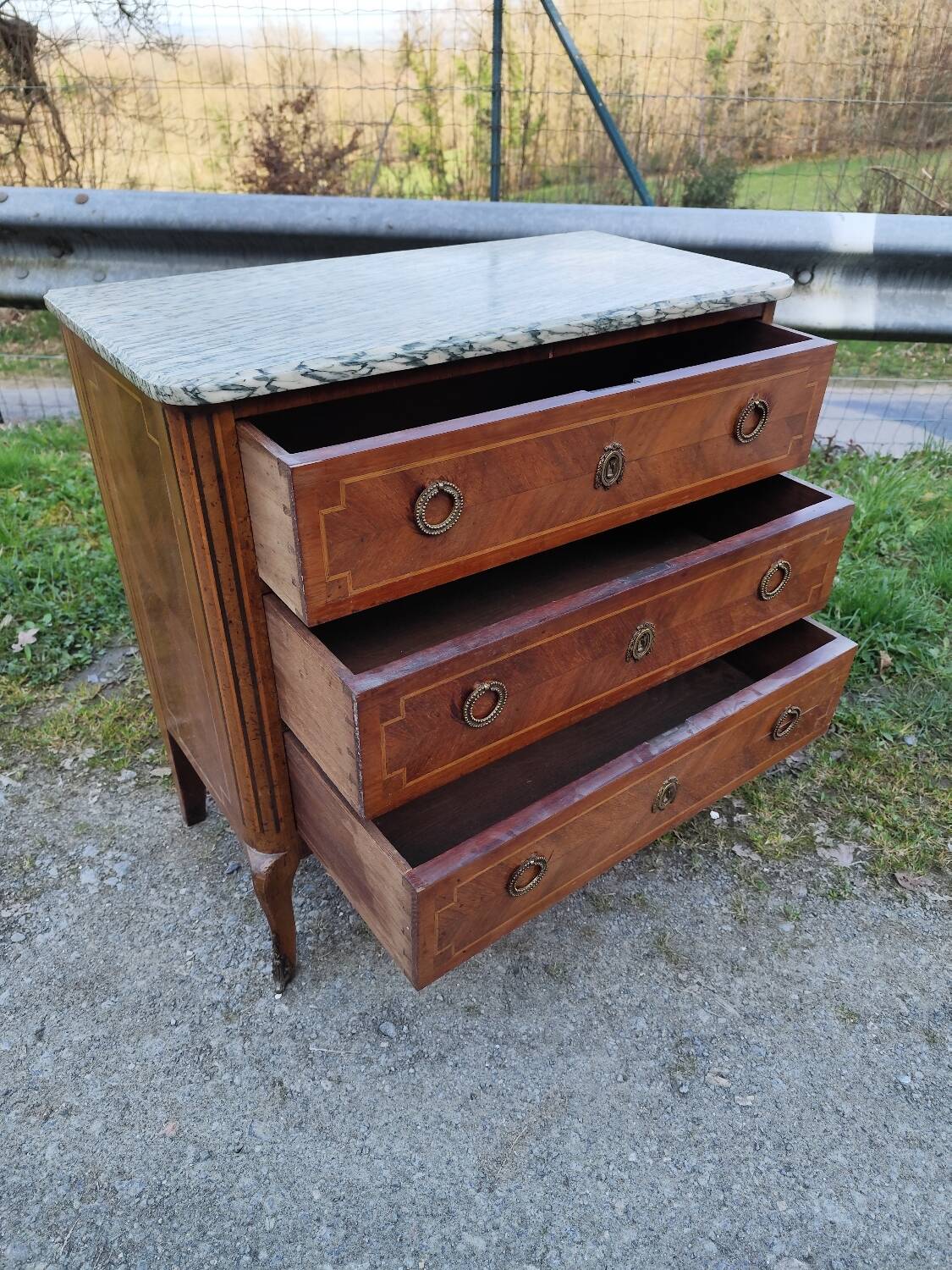 Louis XV, Louis XVI transitional style chest of drawers in marble and wood marquetry