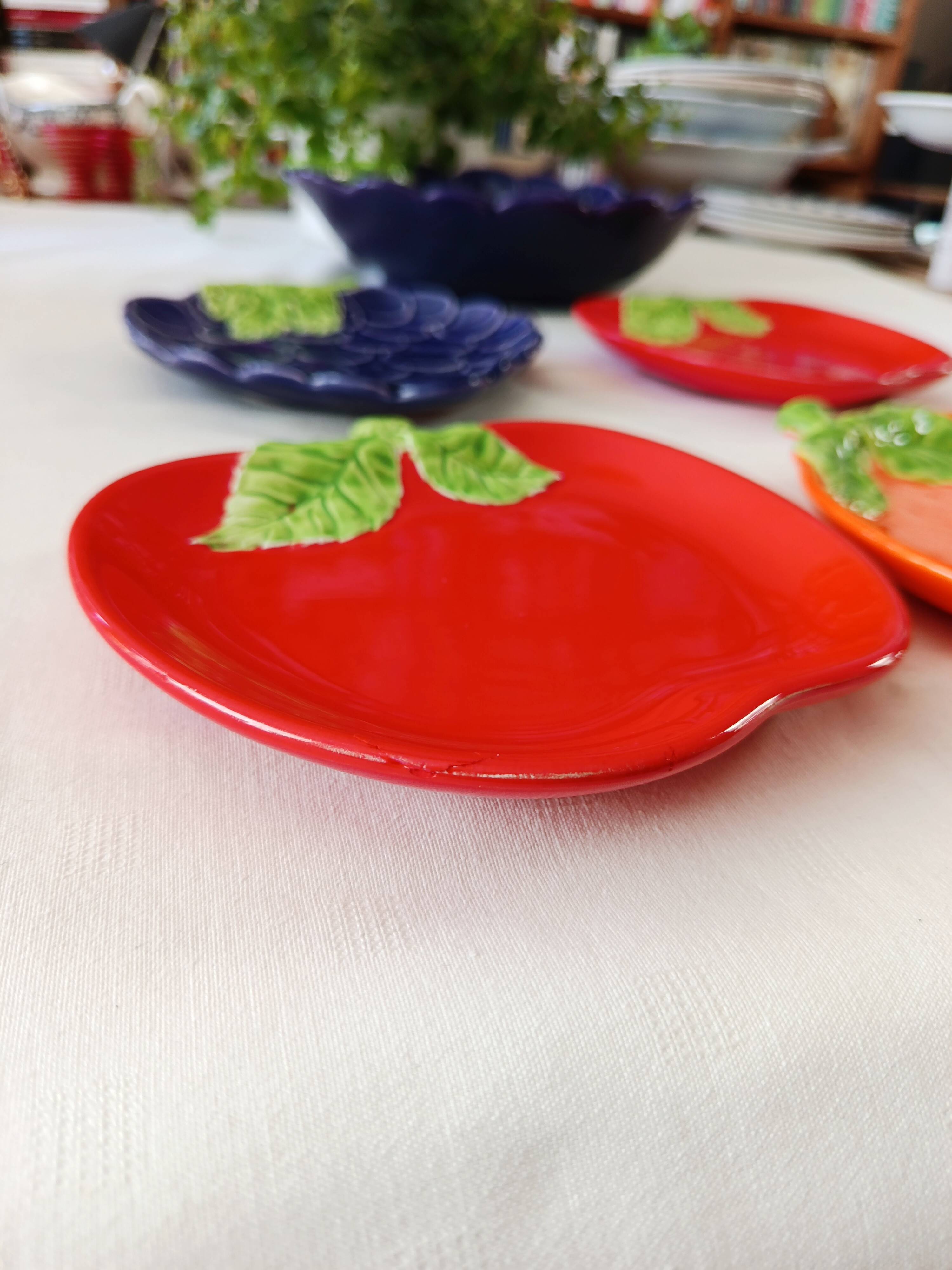 bowls and cups in slipware fruits