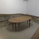 Half-moon extendable oak table for 2 to 8 people.