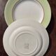 Set of 5 Salins Isoard model plates in vintage green earthenware.