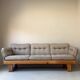 Two vintage Swedish sofas and a pine table