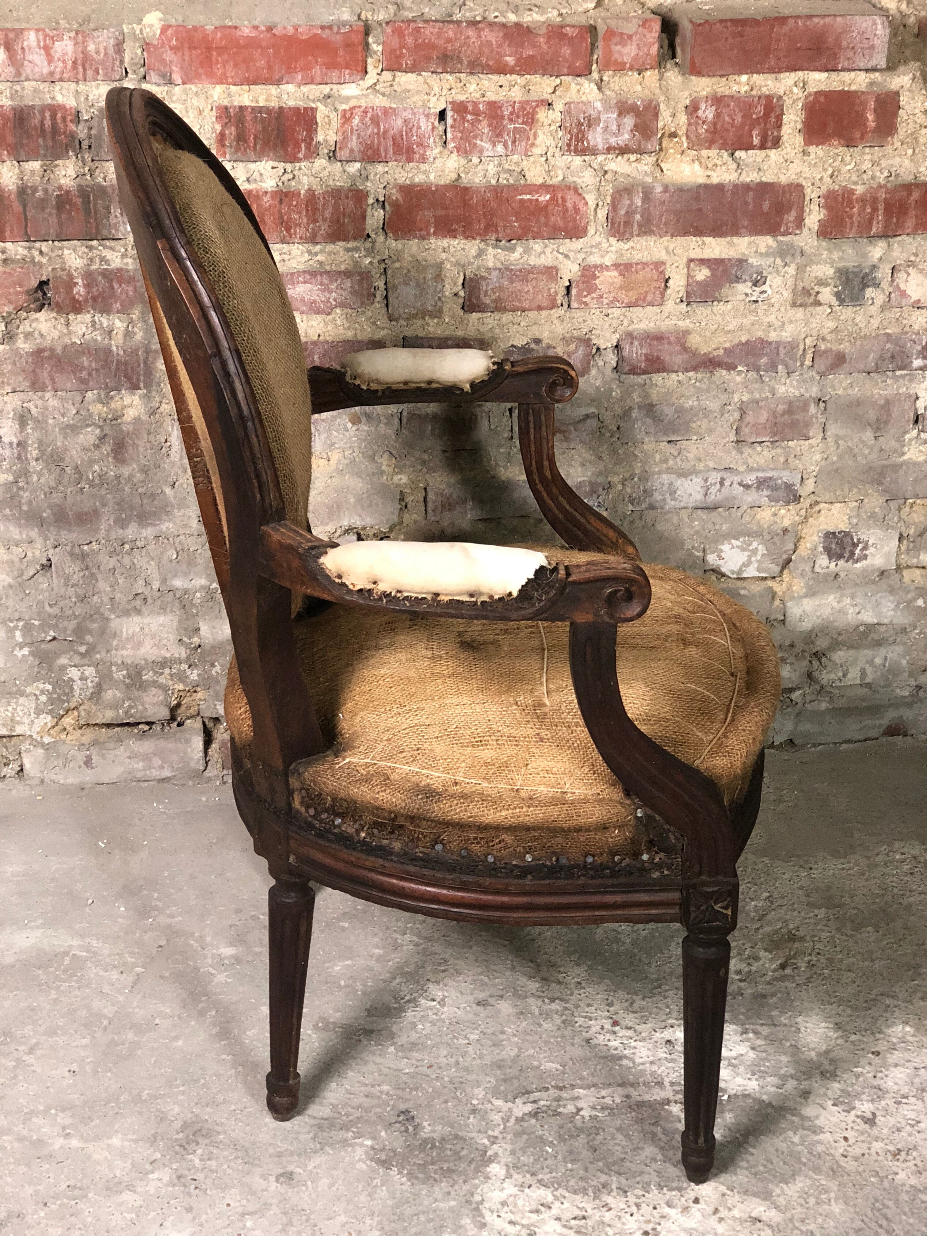 Louis XVI period medallion armchair